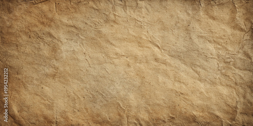 Vintage brown grunge crumpled paper texture background with wrinkled rough surface and aged antique parchment design.