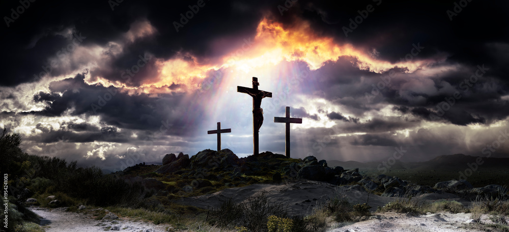 Fototapeta premium Calvary Hill - Crucifixion Of Jesus - Three Crosses With Dramatic Clouds …and there was darkness over the whole land... Sunbeam Flare And Glittering Effects On Christ 