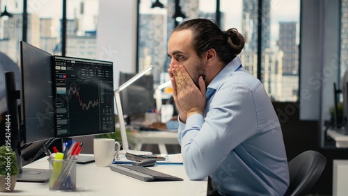 Tableau sur toile Sad portfolio manager in office dejected by negative stock market investment returns
