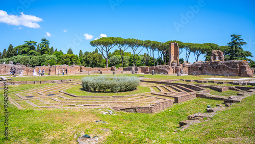 Tableau sur toile Visitors explore the Domus Flavia ruins at the Roman Forum in Rome, Italy