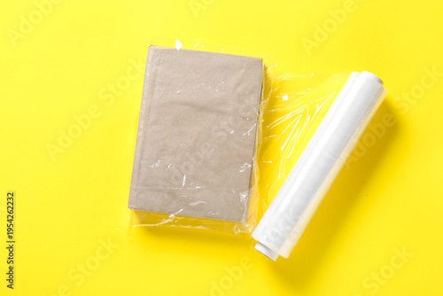 Roll of stretch wrap and bo...