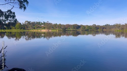 Panoramic footage of Wentworth Falls Lake and the surrounding shoreline forest in the Blue Mountains town of Wentworth Falls in New South Wales, Australia