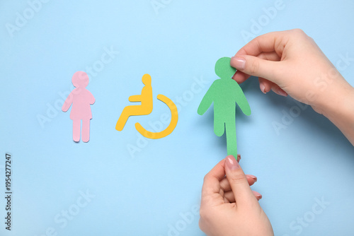 Female hands with paper hum...