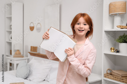 Cute teenage happy redhead ...