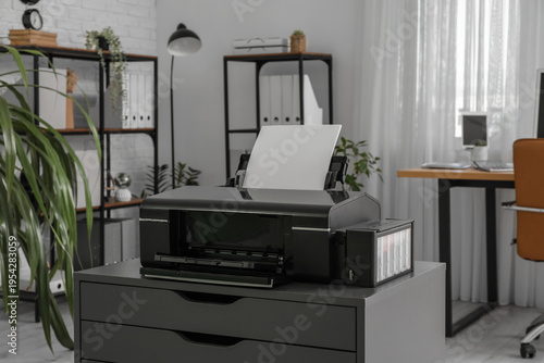 Modern printer on black che...