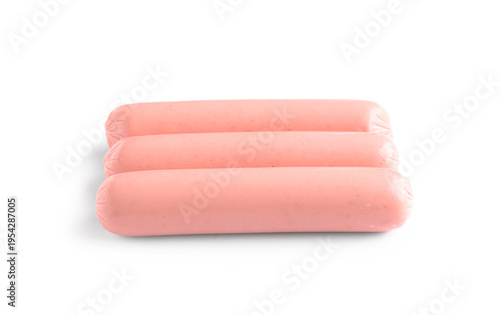 Tasty thin sausages on whit...