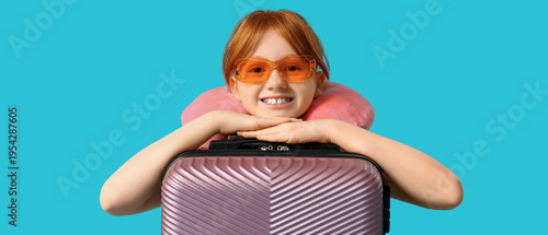 Cute girl with neck pillow ...