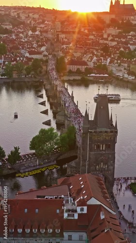  Aerial view of Prague Charles bridge and old town at sunset, over river. Czech Republic city Prague, city skyline 