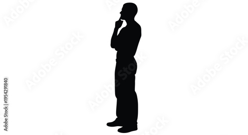 Silhouette of a man in thought standing in profile against a white background