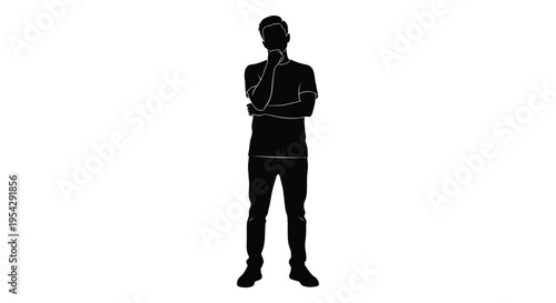 Silhouette of a man standing with arms crossed deep in thought