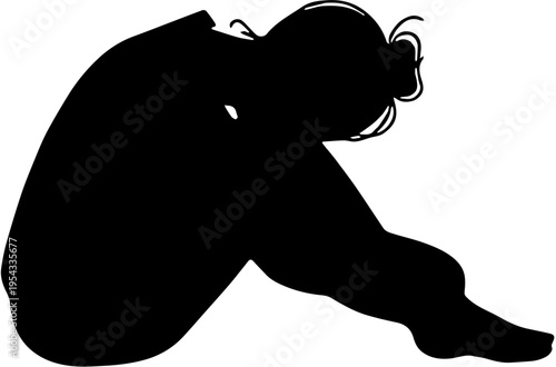 Silhouette of a Sad Woman Sitting and Crying While Hugging Her Knees