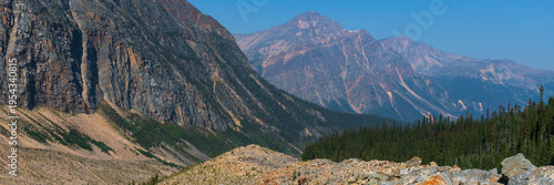 Panorama of the Astoria River Valley and distant mountain peaks from the Cavell Meadows hiking trail in Jasper National Park, Alberta, Canada.