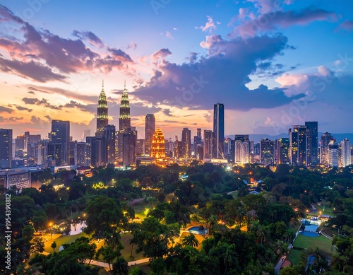 Wallpaper Mural Aerial view of a city skyline at dusk with two prominent towers. The lush green park dominates the foreground Torontodigital.ca