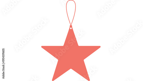 A pink star shaped Christmas ornament hanging from a string