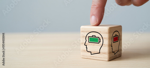 Billede på lærred Mental health concept with battery level indicator inside human head on wooden c