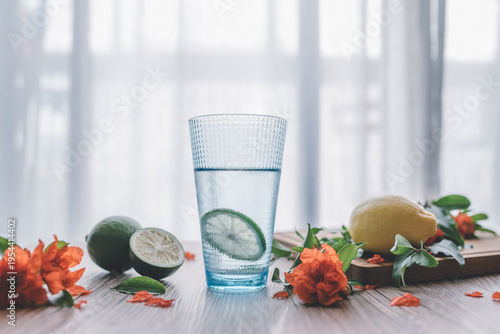 Fotografía Fresh Lemonade Ingredients with Water and Citrus