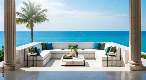 Serene oceanfront patio with white sectional sofa