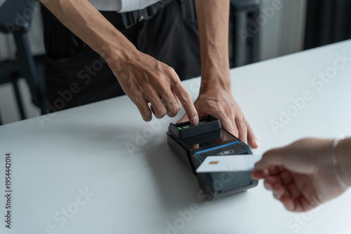 Man hands using credit card payment cashless technology