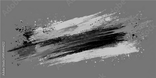 Abstract brushstrokes in grayscale create a dynamic and artistic visual effect, with texture and contrast that embodies creativity and design, representing a sense of artistic flair.