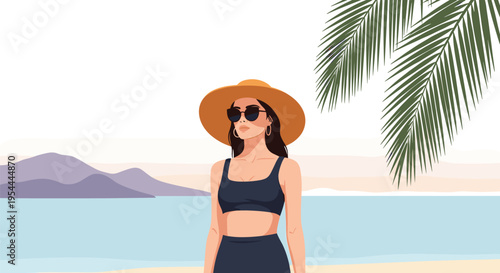 Beautiful young woman wearing a sun hat and dark swimsuit standing on a tropical beach under palm tree leaves during a summer vacation.