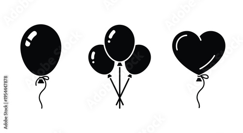 A cluster of black balloons including a heart shape silhouette