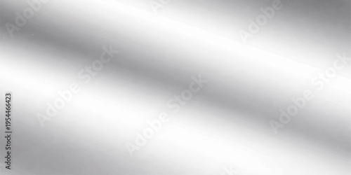 A shiny brushed metal texture plate with a silver stainless steel pattern and gray industrial aluminum surface backdrop featuring light metallic reflections for a textured material wallpaper