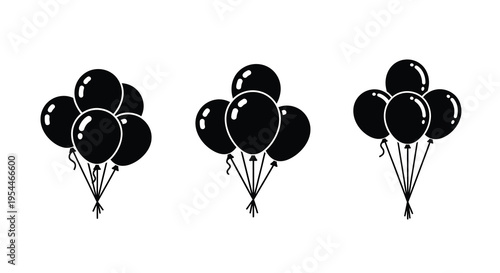 Three groups of black balloons float upwards simple silhouette