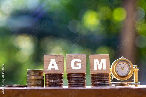 AGM Annual General Meeting is a meeting that a company must hold every year to inform shareholders about the company's financial performance.