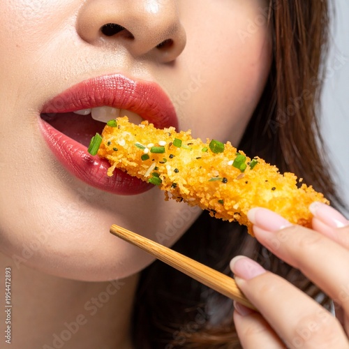 A hyper-realistic macro shot capturing a sensual, honey-drizzled tempura shrimp being eaten. The crispy texture contrasts vividly with glossy, wet lips.