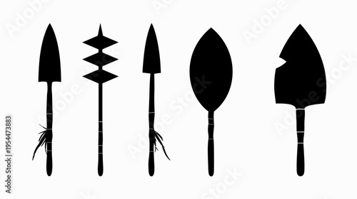 Five stylized black silhouettes of spearheads and blades on a white background