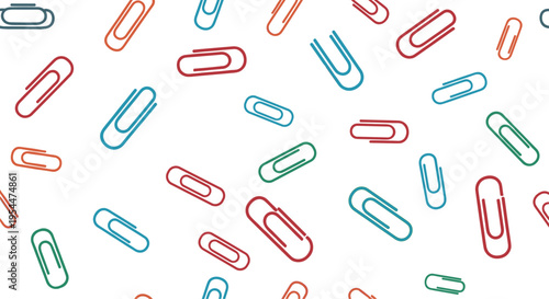 Seamless pattern featuring colorful paper clips in various positions over a clean white background for office and school supplies theme.