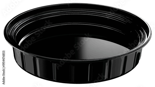 A shiny, black, cylindrical container stands at an angle against a white backdrop