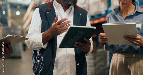 Photos Logistics, tablet and hands of people in warehouse, export schedule discussion and workflow coordination