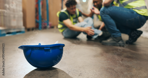 Photos Helmet, slip and employee with injury in warehouse, logistics and stock distribution or supply chain