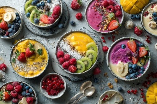 Wallpaper Mural Colorful smoothie bowls assortment top view healthy breakfast with fresh fruits and superfoods Torontodigital.ca