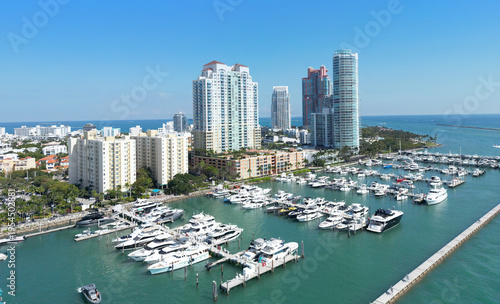 Miami Beach with yachts and marina. Marina in Miami Beach Florida with boats. Miami Beach marina and Biscayne Bay. Aerial drone view of Miami Beach marina with luxury yachts.