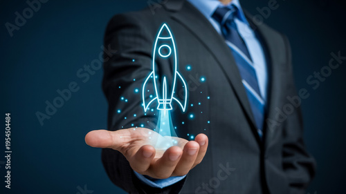 Businessman In Suit Holding Glowing Rocket Icon For Startup And Innovation Concepts