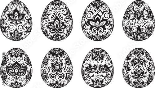 A set of intricately designed black and white Easter eggs