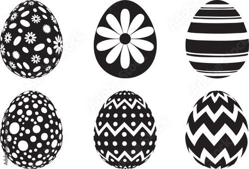 A collection of six black and white decorated Easter eggs