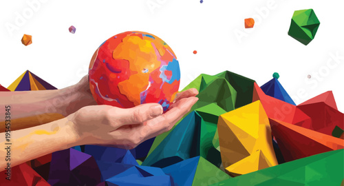 Hands holding a colorful painted globe over a landscape of geometric paper mountains isolated on white background