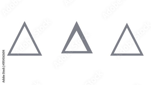 Three minimalist gray triangles against a stark white background create a graphic design