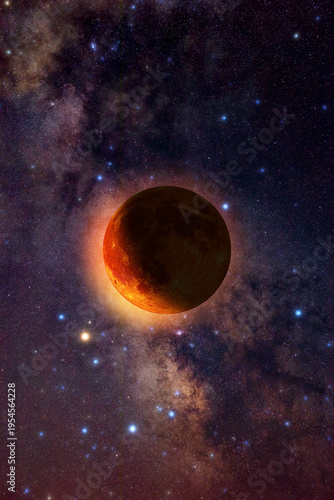 Lunar eclipse on a starry Milky Way background.