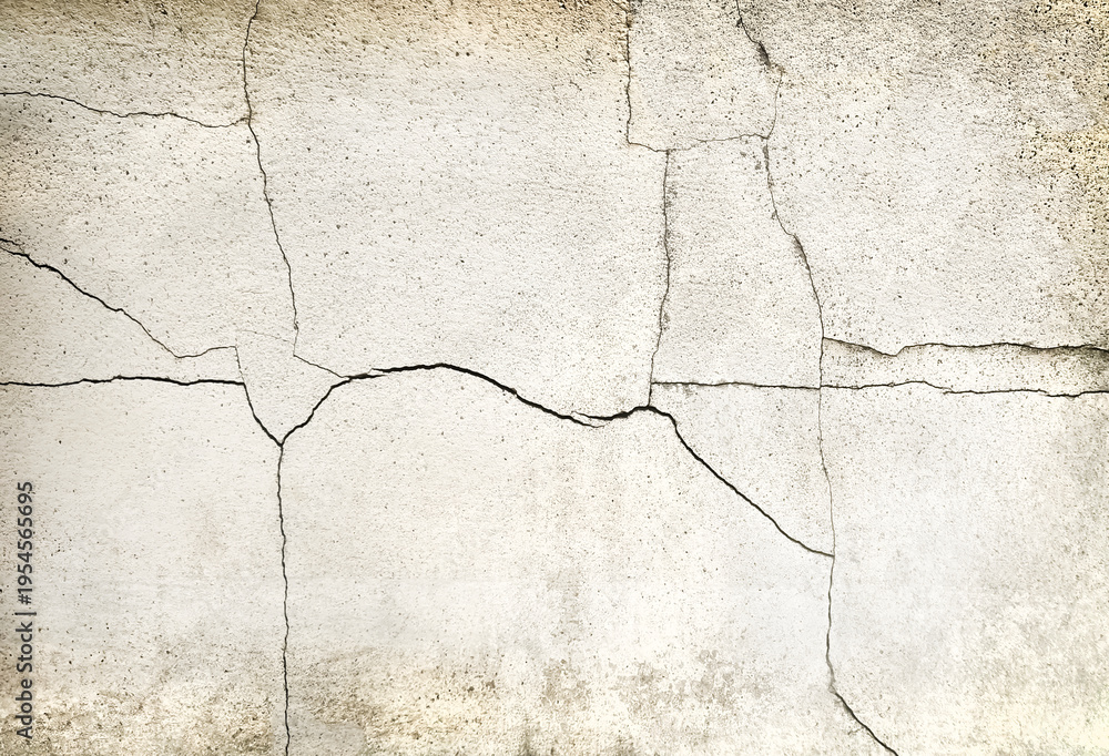Obraz premium Texture of a concrete wall with cracks and scratches which can be used as a background