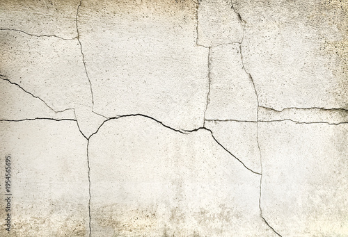 Texture of a concrete wall with cracks and scratches which can be used as a background