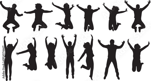 Silhouettes of people jumping in the air with joy