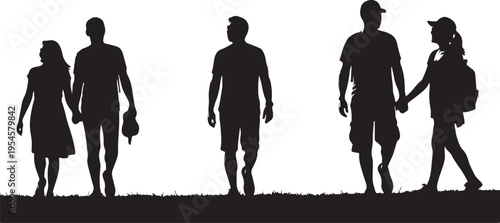 Silhouettes of couples and a solo person walking together outdoors