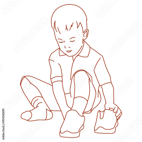 boy sitting and concentrating on putting on his black shoes.eps