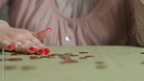 Quadro su tela Child Counting Coins on Table for Financial Education Concept, have fun and enjo