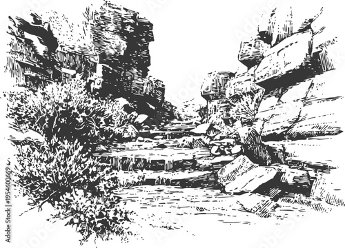 Stone steps pathway in rocky desert landscape with sparse vegetation and rugged terrain