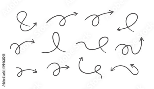 Fotografía Collection of twelve hand drawn dark grey curved arrows and ampersand symbols ha